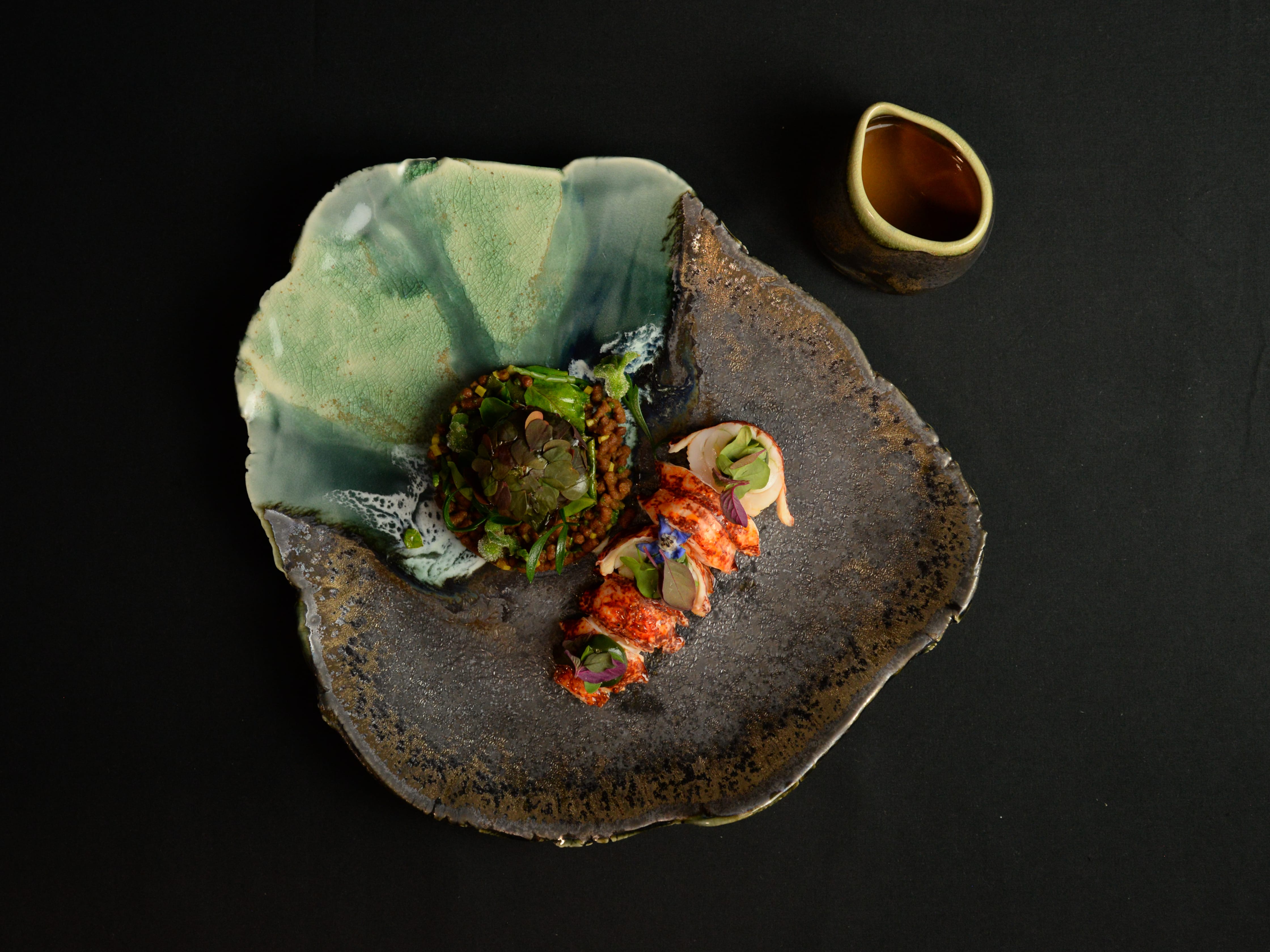 Warm blue lobster, Wheat bread with Sea Flavors and Stuffed Artichoke