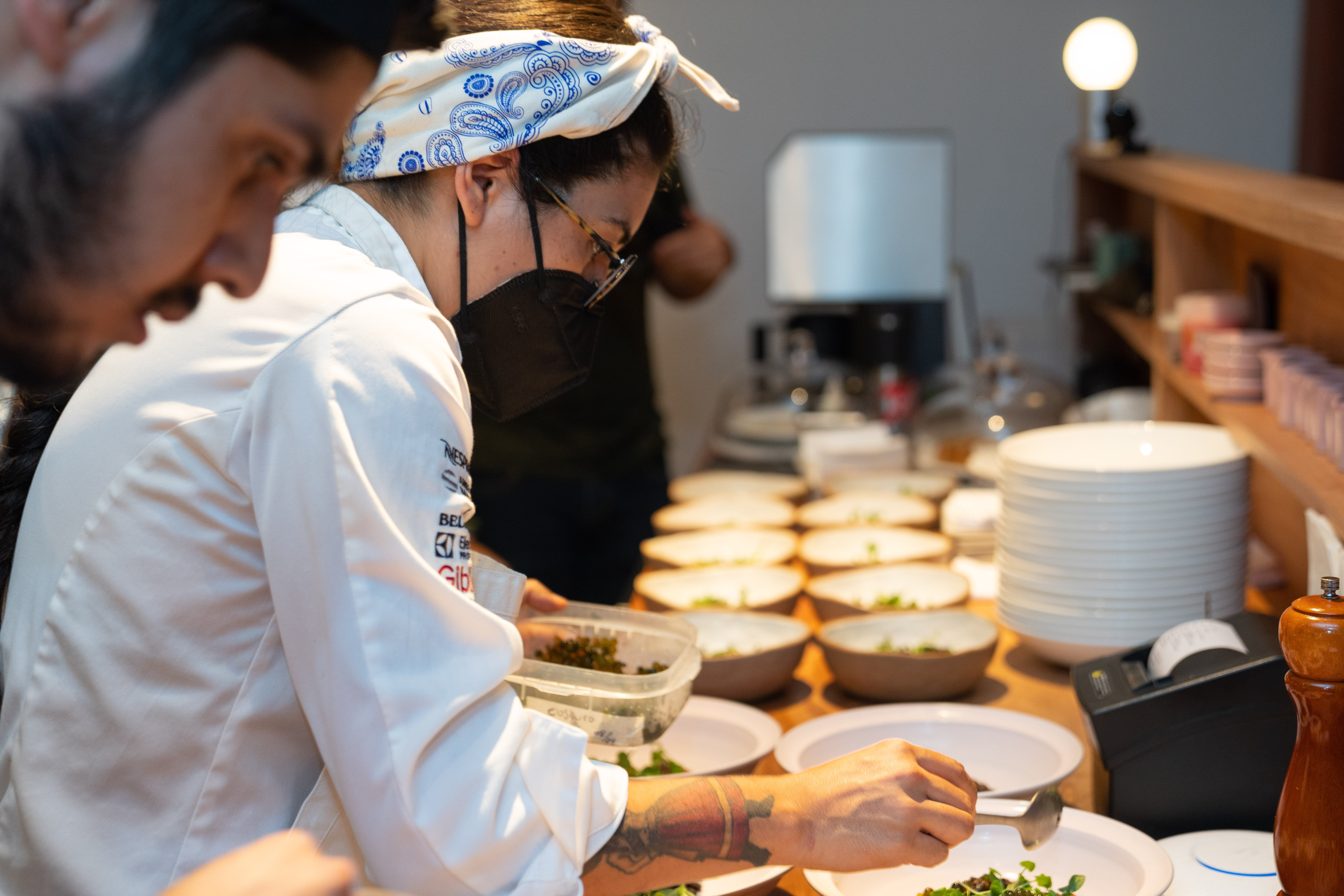 Female chef cooking