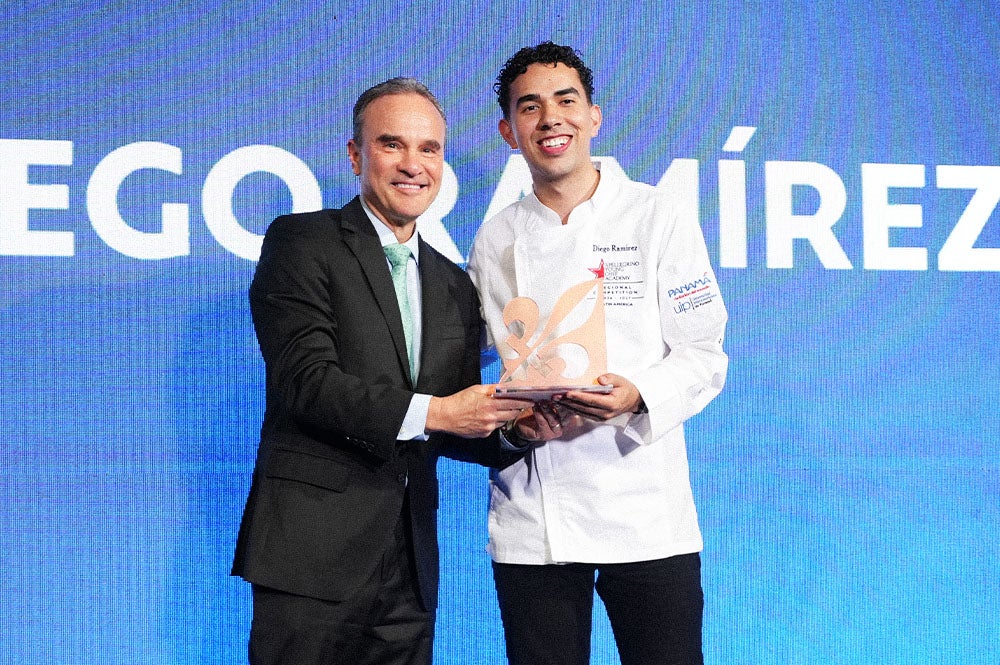 Diego Ramirez receiving his award 
